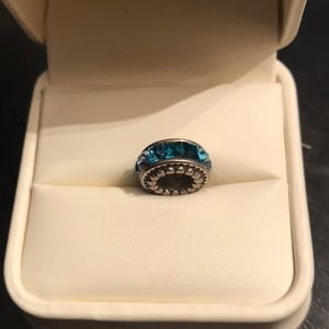 Silver charm with blue stones ombré